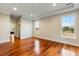 Spacious bedroom with hardwood floors and large windows at 4712 Westervelt Rd, Meggett, SC 29449