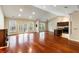 Open living room and kitchen with hardwood floors at 4712 Westervelt Rd, Meggett, SC 29449