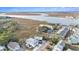 Aerial view showcasing home's location near the water at 79 Sandbar Ln, Folly Beach, SC 29439