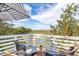 Deck overlooking marsh views with seating for relaxing at 79 Sandbar Ln, Folly Beach, SC 29439