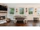 Small dining area with brick accent wall and fireplace at 79 Sandbar Ln, Folly Beach, SC 29439