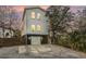 Modern two-story house with gray accents and fenced yard at 79 Sandbar Ln, Folly Beach, SC 29439