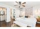 Main bedroom with king-size bed, ceiling fan and AC at 79 Sandbar Ln, Folly Beach, SC 29439