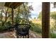 Peaceful patio with hanging chairs and marsh views at 79 Sandbar Ln, Folly Beach, SC 29439