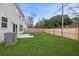 Spacious backyard with wood fence and patio at 8700 Forte Dr, North Charleston, SC 29406