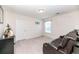 Versatile bonus room with leather recliner and window at 8700 Forte Dr, North Charleston, SC 29406