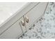 Close up of stylish cabinets with gold handles and decorative tiling at 9005 Stern Aly, Johns Island, SC 29455