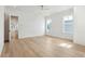 A spacious bedroom with three windows and hardwood flooring at 9005 Stern Aly, Johns Island, SC 29455