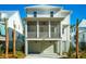 Beautiful home exterior with a screened in porch, garage, and nice curb appeal at 9005 Stern Aly, Johns Island, SC 29455