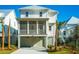 Charming two-story home with a front-facing garage and screened porch at 9005 Stern Aly, Johns Island, SC 29455