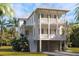 Two-story home with double garage and front porch at 9005 Stern Aly, Johns Island, SC 29455