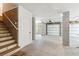 Ground-level garage includes garage doors, storage and stairs to the upper level at 9005 Stern Aly, Johns Island, SC 29455