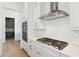 Modern kitchen with stainless steel appliances, white cabinets, and a gas range and double oven combo at 9005 Stern Aly, Johns Island, SC 29455