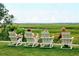 Four chairs overlooking a peaceful marsh at 9009 Stern Aly, Johns Island, SC 29455