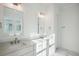 Bright bathroom with double sinks and vanity, and a marble tile floor at 9009 Stern Aly, Johns Island, SC 29455
