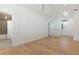 Bright bedroom boasts wood floors and ample space, leading to an attached bathroom at 9009 Stern Aly, Johns Island, SC 29455