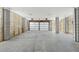 Spacious garage with concrete floors and wooden slats at 9009 Stern Aly, Johns Island, SC 29455