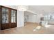 Open floor plan with wooden floors and glass doors leading to outdoor at 9009 Stern Aly, Johns Island, SC 29455