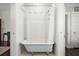 Small bathroom with clawfoot tub and shower at 11 Perry St, Charleston, SC 29403