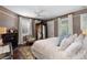 Spacious bedroom with fireplace and antique armoire at 11 Perry St, Charleston, SC 29403