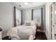 Cozy bedroom with hardwood floors and window seating at 11 Perry St, Charleston, SC 29403