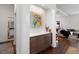 Entryway with built-in cabinetry and view into living room at 11 Perry St, Charleston, SC 29403