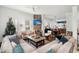 Spacious living room with sectional sofa, fireplace, and large TV at 11 Perry St, Charleston, SC 29403