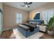 Bedroom with wood floors, ceiling fan, and window shutters at 1374 Leisure Dr, Summerville, SC 29486