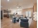 Open concept living room and kitchen with hardwood floors and a neutral color scheme at 1374 Leisure Dr, Summerville, SC 29486