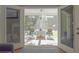 Relaxing screened porch with table and chairs at 1374 Leisure Dr, Summerville, SC 29486