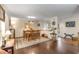 Spacious dining area with hardwood floors and charming decor at 14 Wappoo Creek Pl, Charleston, SC 29412