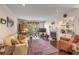 Comfortable living room with hardwood floors, fireplace, and built-ins at 14 Wappoo Creek Pl, Charleston, SC 29412