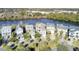 Aerial view of houses near a lake, ideal for waterfront living at 1615 Paradise Lake Dr, Mount Pleasant, SC 29464