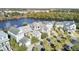 Aerial view of houses near a lake, ideal for waterfront living at 1615 Paradise Lake Dr, Mount Pleasant, SC 29464
