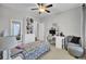 Cozy bedroom with twin bed and built-in shelving at 1615 Paradise Lake Dr, Mount Pleasant, SC 29464