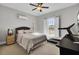 Spacious bedroom with a queen bed, window, and home gym at 1615 Paradise Lake Dr, Mount Pleasant, SC 29464