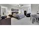 Bright bedroom featuring a king-size bed and a workspace at 1615 Paradise Lake Dr, Mount Pleasant, SC 29464