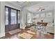 Bright entryway with hardwood floors, a large door, and access to a cozy sitting area at 1615 Paradise Lake Dr, Mount Pleasant, SC 29464