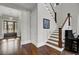 Elegant entryway with hardwood floors and a grand staircase at 1615 Paradise Lake Dr, Mount Pleasant, SC 29464