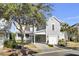 Gray house with a covered carport and manicured lawn at 1615 Paradise Lake Dr, Mount Pleasant, SC 29464