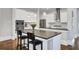 Modern kitchen with white cabinets, stainless steel appliances, and an island at 1615 Paradise Lake Dr, Mount Pleasant, SC 29464