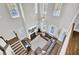 Spacious living room with hardwood floors, fireplace and large windows at 1615 Paradise Lake Dr, Mount Pleasant, SC 29464