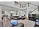 Spacious living room with a large sectional sofa and piano at 1615 Paradise Lake Dr, Mount Pleasant, SC 29464