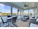 Relaxing covered porch with wicker furniture and lake views at 1615 Paradise Lake Dr, Mount Pleasant, SC 29464
