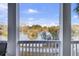 Enjoy serene lake views from this covered porch at 1615 Paradise Lake Dr, Mount Pleasant, SC 29464