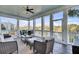 Relaxing screened porch overlooking a tranquil waterway at 1615 Paradise Lake Dr, Mount Pleasant, SC 29464