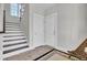 Staircase with dark wood steps and white risers at 1615 Paradise Lake Dr, Mount Pleasant, SC 29464