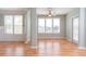 Bright dining area with hardwood floors and large windows at 2333 Chatelain Way, Mount Pleasant, SC 29464