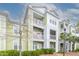 Attractive light green 3-story building with balconies and landscaping at 2333 Chatelain Way, Mount Pleasant, SC 29464