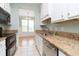 Kitchen with granite countertops, white cabinets and stainless steel appliances at 2333 Chatelain Way, Mount Pleasant, SC 29464